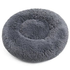 Dale a tu mascota un espacio suave y acogedor con la Cama Tipo Dona Linden™. Peluche suave, base antideslizante y tamaños de 40 a 100 cm para perros y gatos.