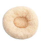 Dale a tu mascota un espacio suave y acogedor con la Cama Tipo Dona Linden™. Peluche suave, base antideslizante y tamaños de 40 a 100 cm para perros y gatos.