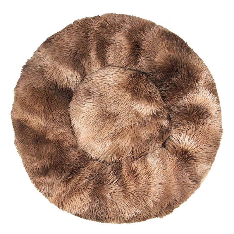 Dale a tu mascota un espacio suave y acogedor con la Cama Tipo Dona Linden™. Peluche suave, base antideslizante y tamaños de 40 a 100 cm para perros y gatos.