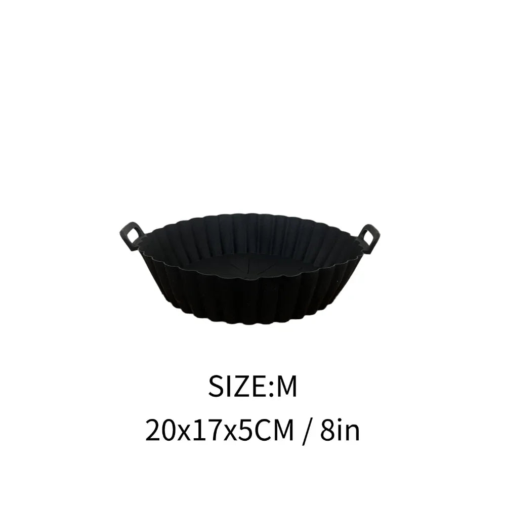Mantén más limpia tu Air Fryer con el Molde de Silicona Reutilizable Linden™. Antiadherente, lavable, con asas y disponible en tamaños M y L.