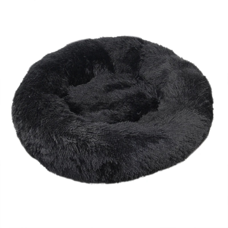 Dale a tu mascota un espacio suave y acogedor con la Cama Tipo Dona Linden™. Peluche suave, base antideslizante y tamaños de 40 a 100 cm para perros y gatos.