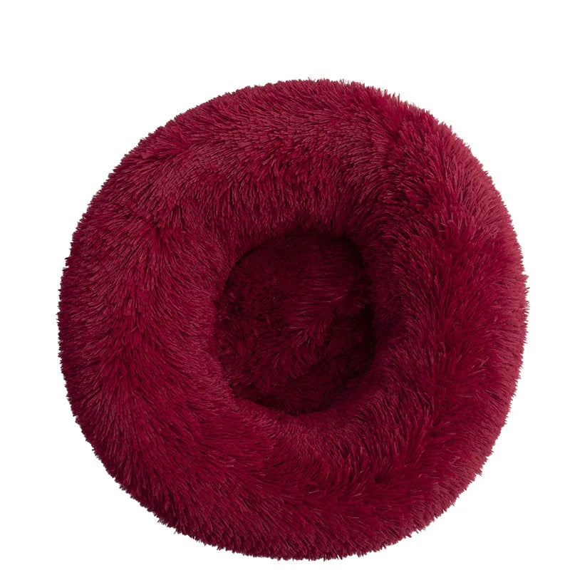Dale a tu mascota un espacio suave y acogedor con la Cama Tipo Dona Linden™. Peluche suave, base antideslizante y tamaños de 40 a 100 cm para perros y gatos.