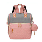 Organiza todo para tu bebé con la Mochila Pañalera Linden™: cambiador plegable, bolsillos térmicos, gran capacidad, separación húmedo/seco y diseño resistente al agua.