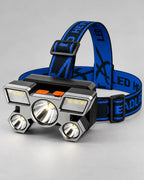 Linterna frontal LED Linden recargable por USB, con cinco luces y banda azul ajustable.
